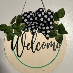 Polka Dot Welcome Sign with Green Leaves